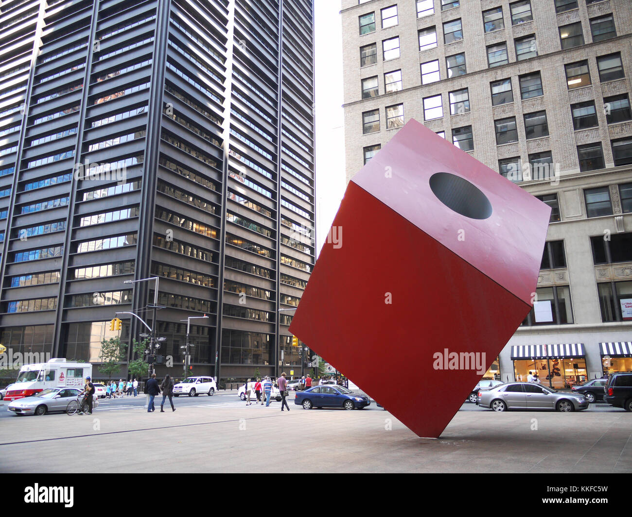 Red Cube, a 1968 sculpture by Isamu Noguchi which sits on Broadway, between Liberty and Cedar streets in New York's financial district. Stock Photo