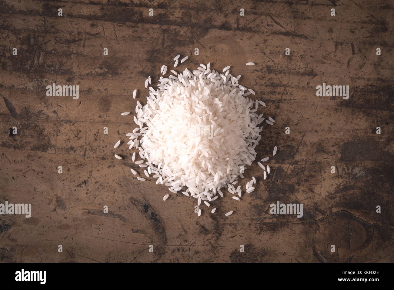 Basmati thaibonnet white rice on wood background Stock Photo - Alamy
