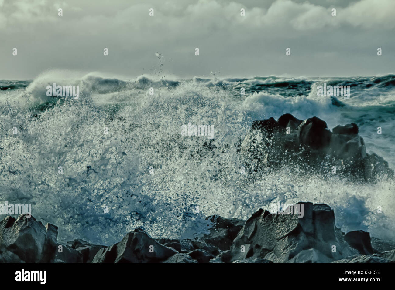 turbulent waves of Pacific ocean and rugged beauty of basalt rocks ...