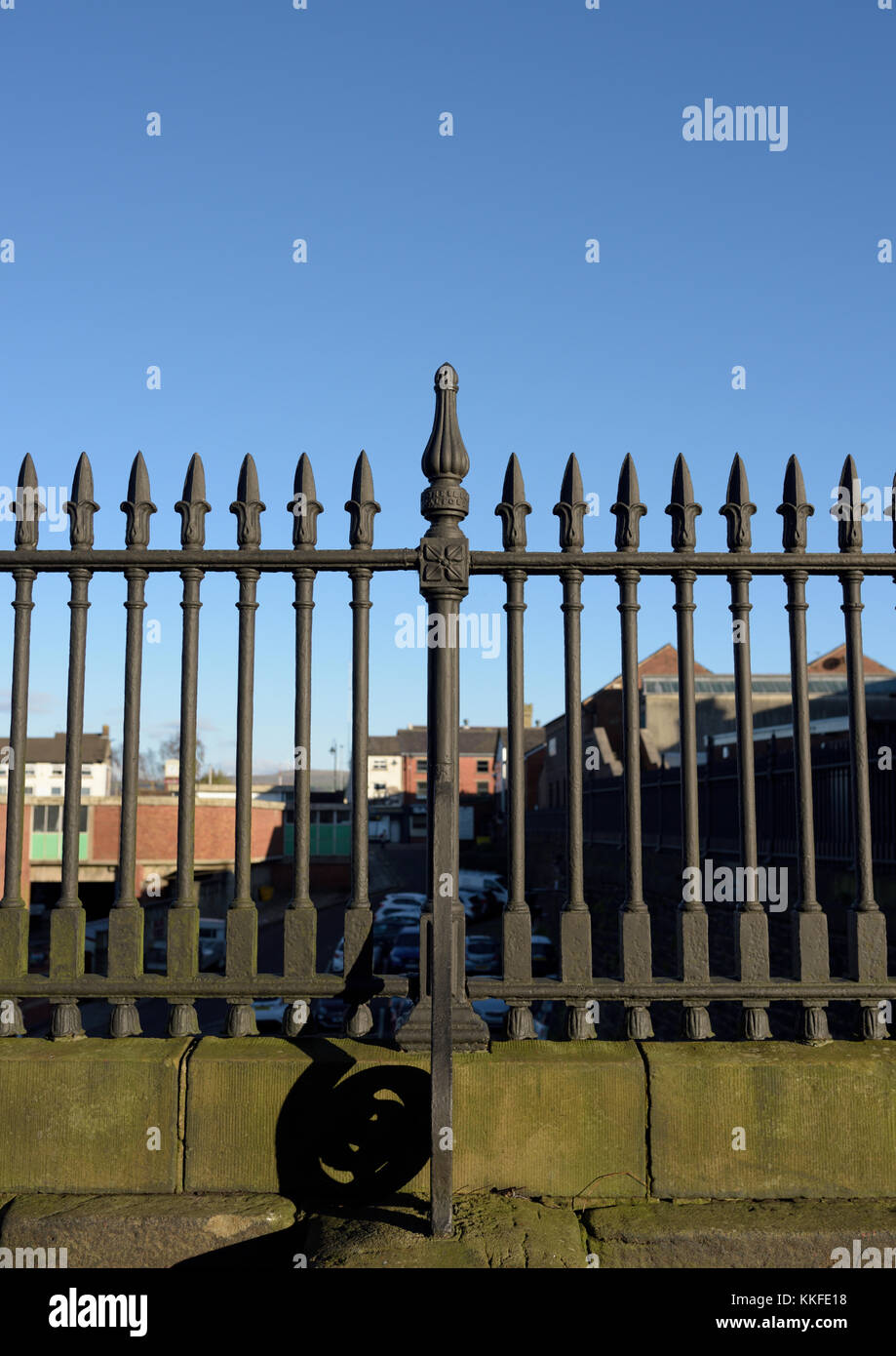 Black cast iron railings with sprouting finials on bank street bury lancashire uk Stock Photo