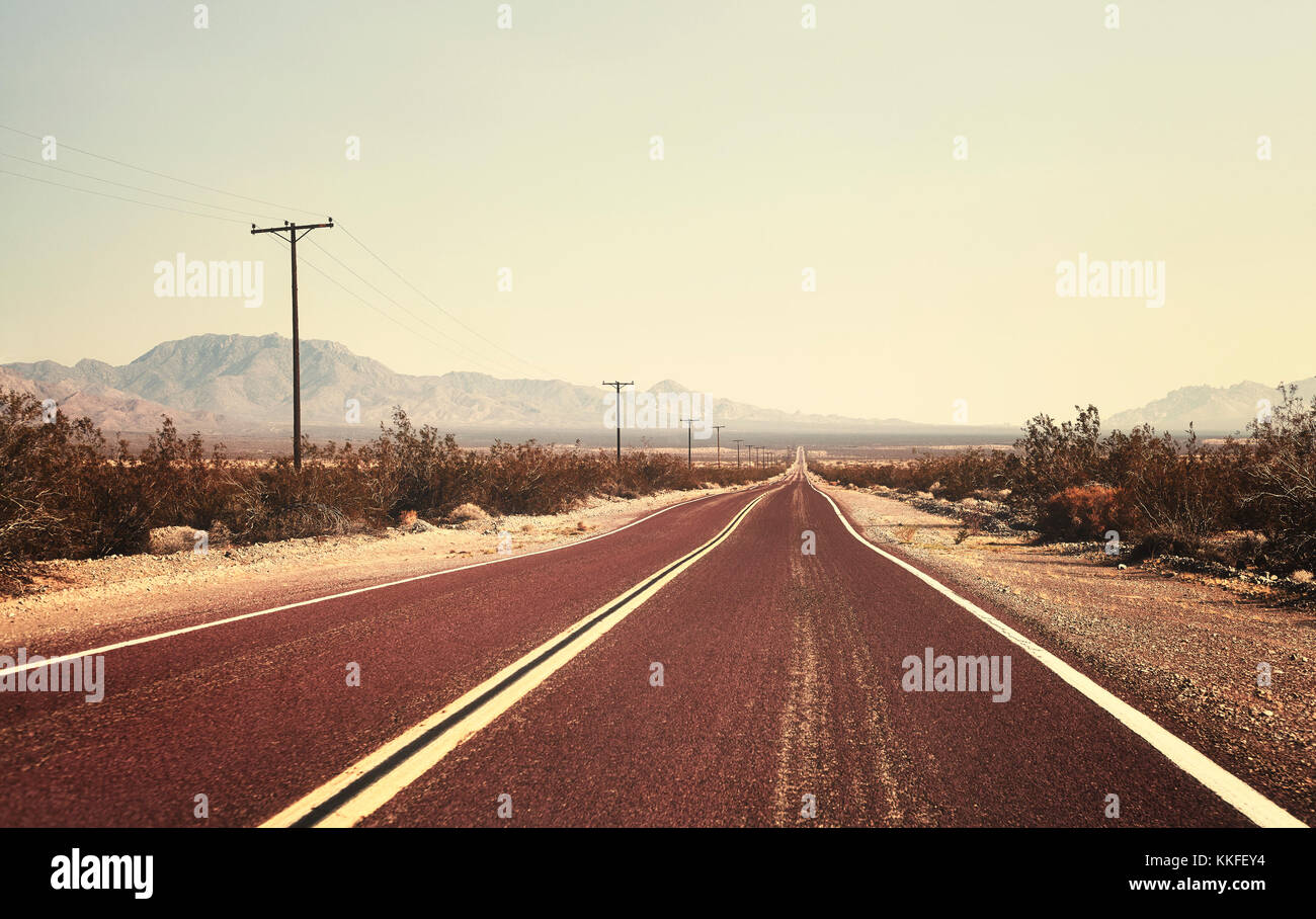 Retro old filmy stylized picture of an empty road, USA Stock Photo - Alamy