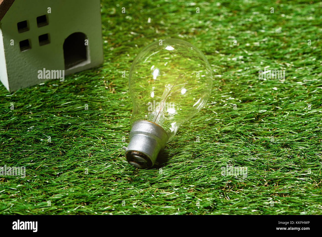 Light bulb on green natural background , green energy concept Stock ...