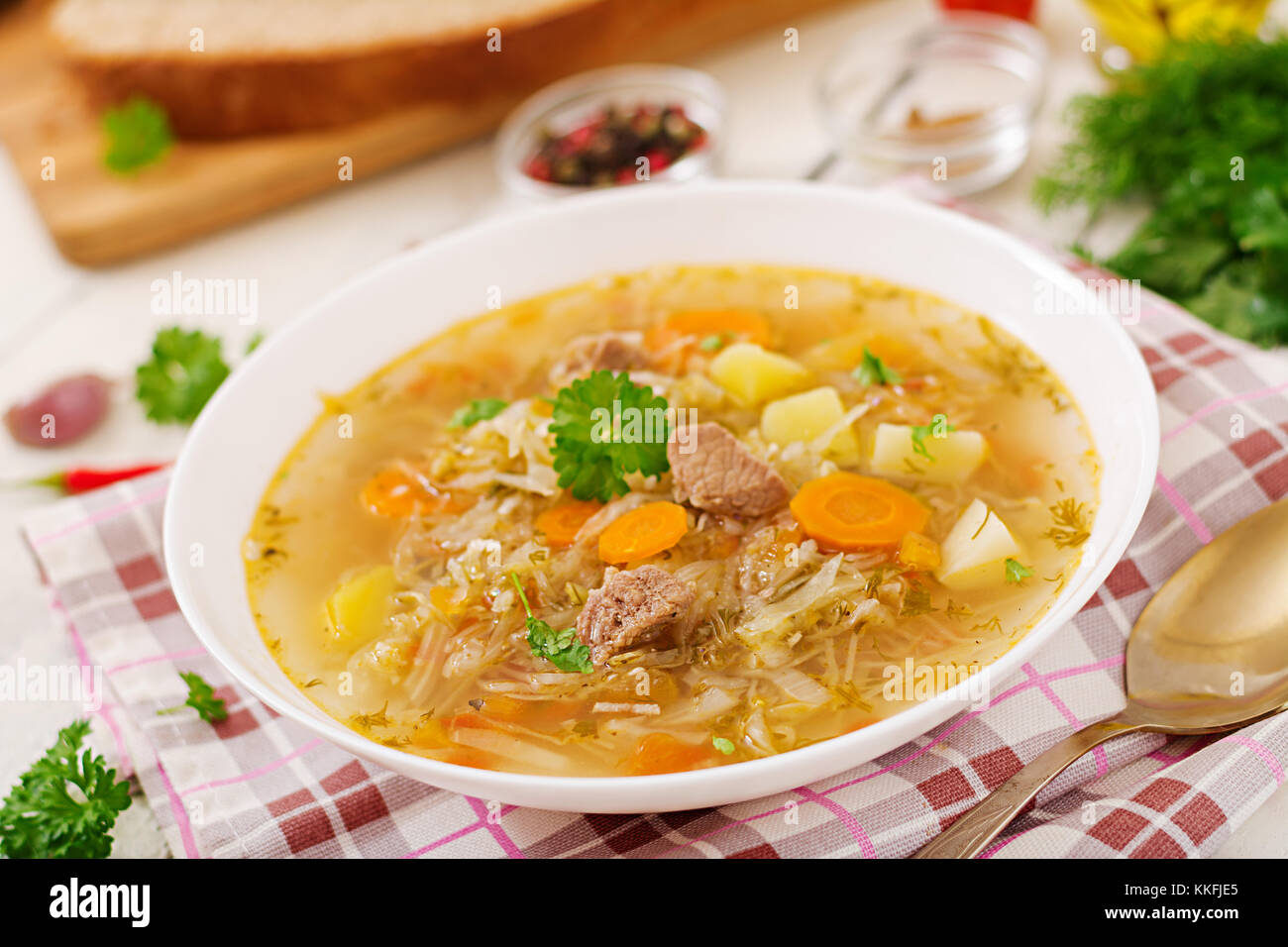Traditional Russian soup with cabbage - sauerkraut soup. Stock Photo