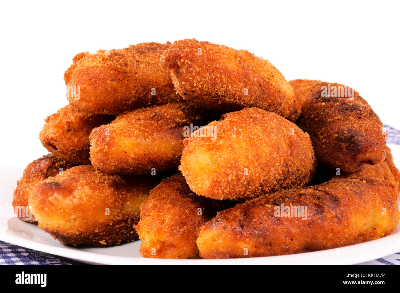 Bunch of the fried potatos sticks isolated on white Stock Photo