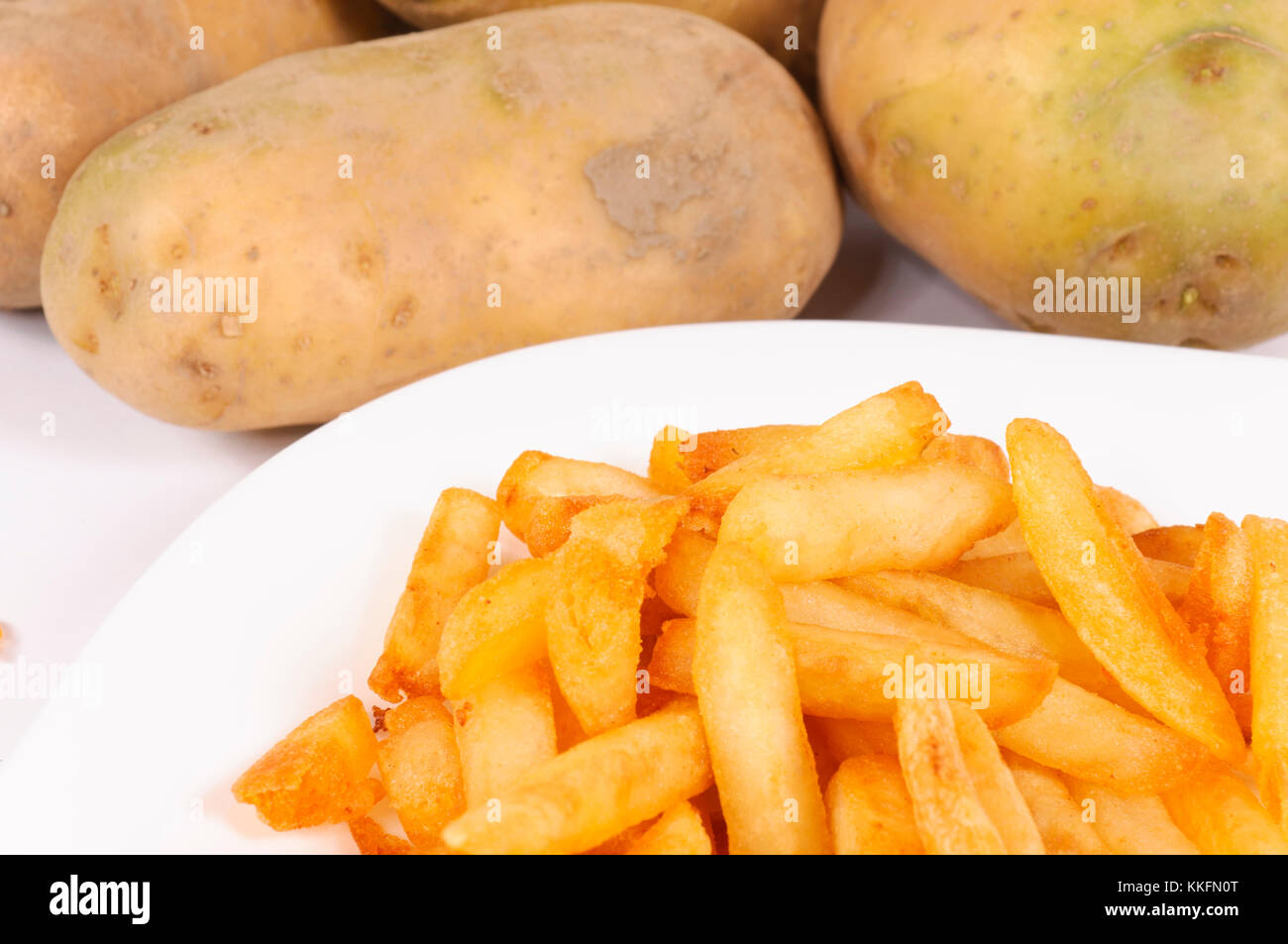 French fries and raw potato Stock Photo