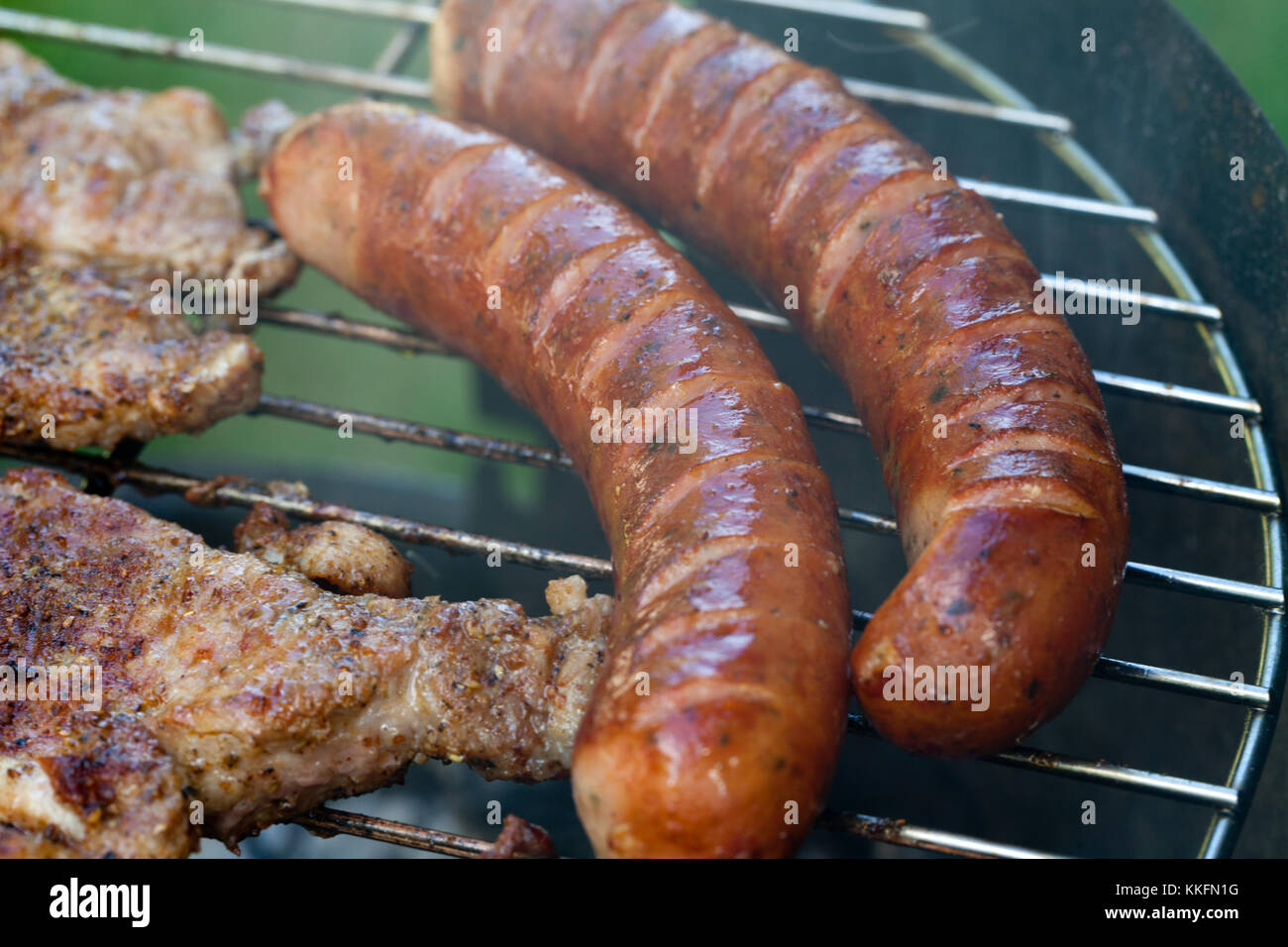 barbecue with delicious grilled meat on grill Stock Photo - Alamy