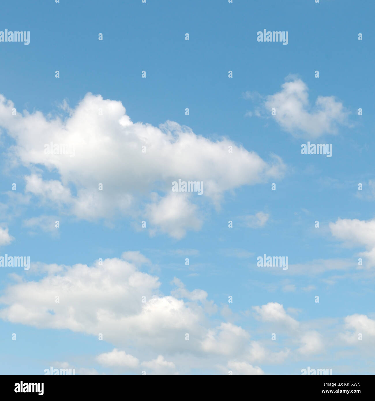 light cumulus clouds in the blue sky Stock Photo - Alamy