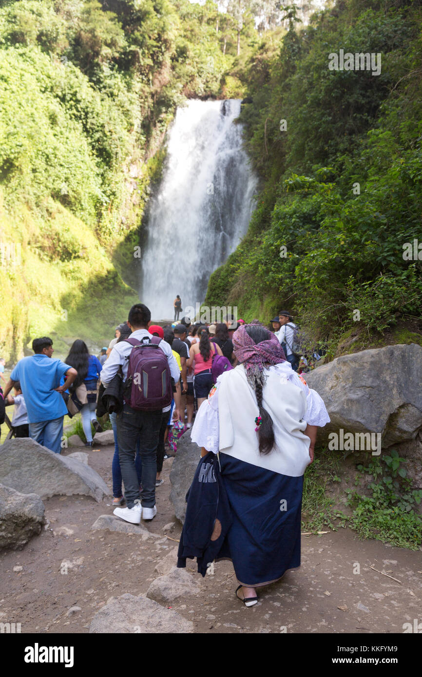 Ecuador waterfall - visitors at Peguche Waterfall, Otavalo, Ecuador, South America Stock Photo