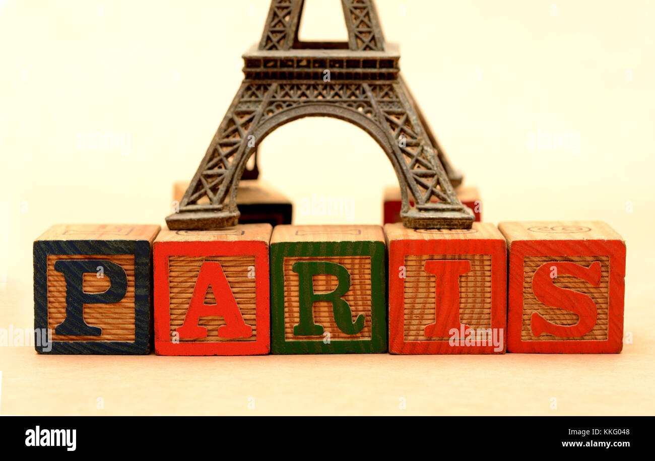 Paris Word blocks with eiffel tower in background Stock Photo - Alamy