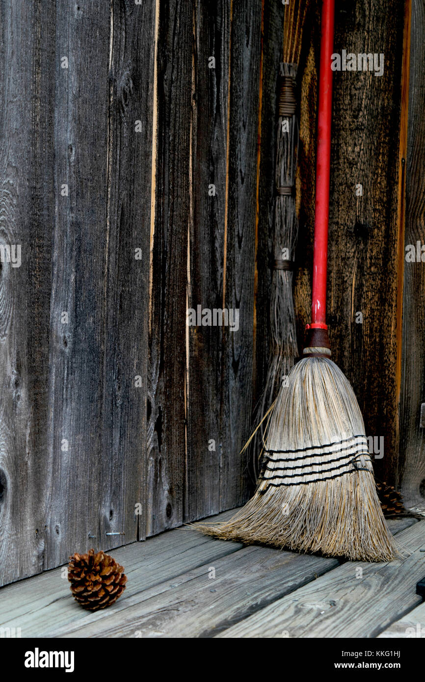 Broom on weathered porch Stock Photo Alamy