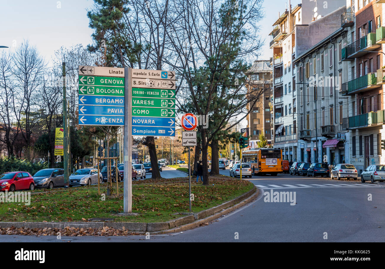 Milan, Italy - Nov 30, 2017: A road junction on the outskirts of Milan showing various directions near and far from Milan Stock Photo