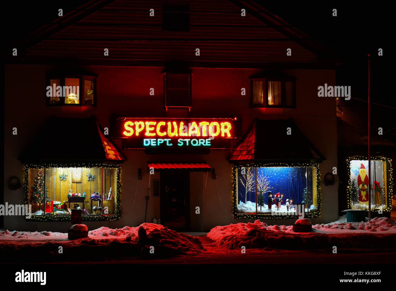 Night view of famous Speculator Department Store in Speculator, NY, with Christmas decorations and window treatments. Stock Photo