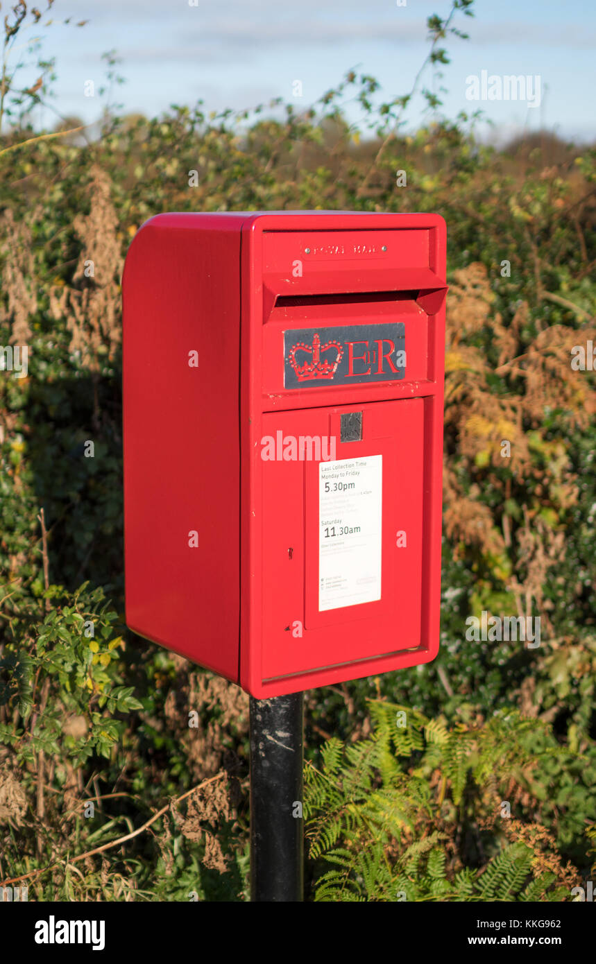 A Royal Mail EiiR modern red post box in rural Co. Durham, England, UK Stock Photo