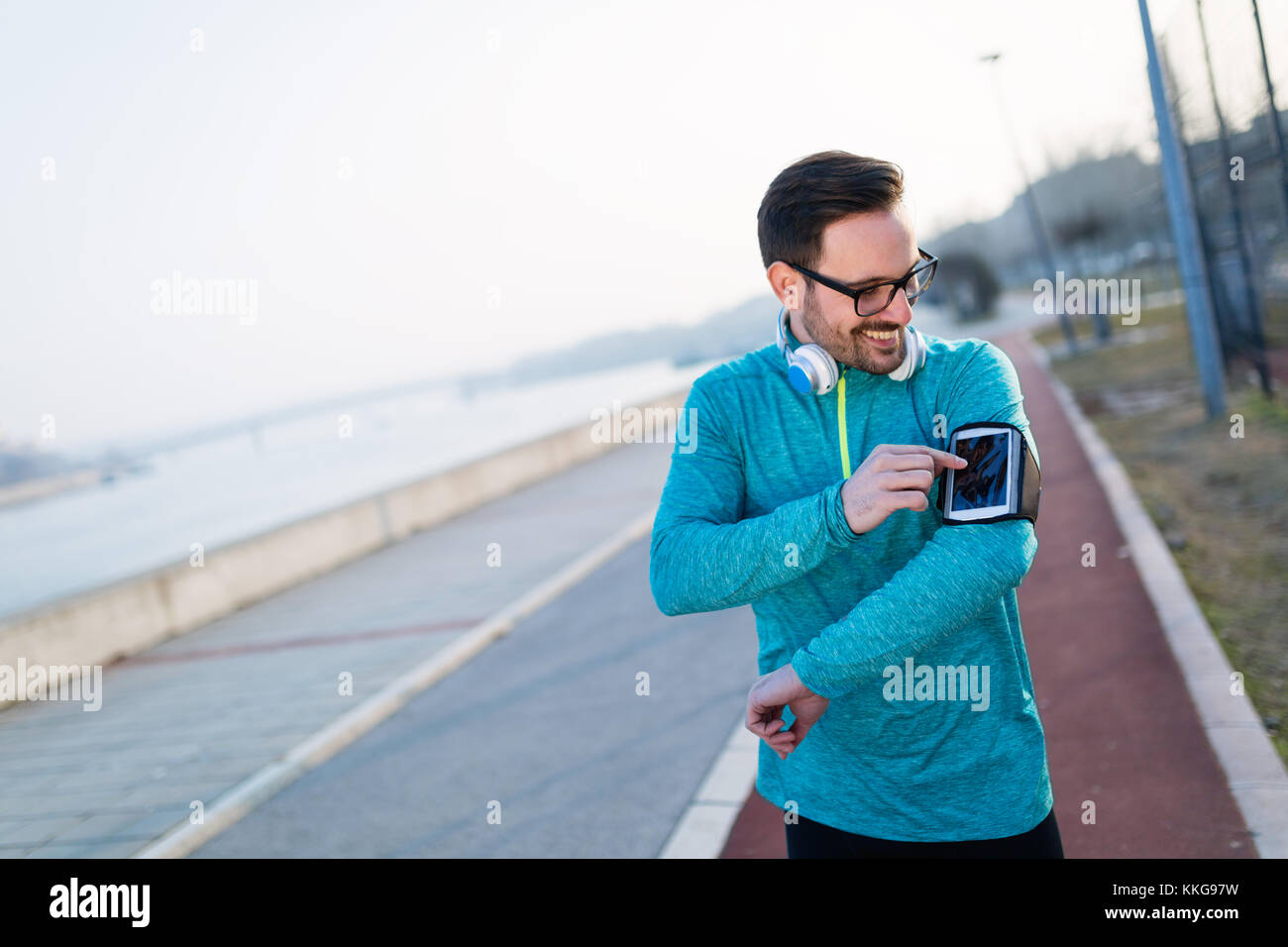Young fitness man running in urban area Stock Photo