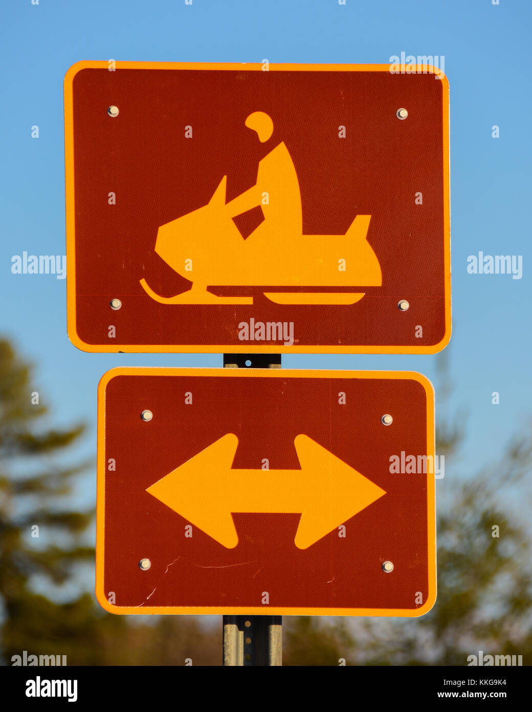 Snowmobile road crossing sign in Speculator, NY in the Adirondacks. Stock Photo