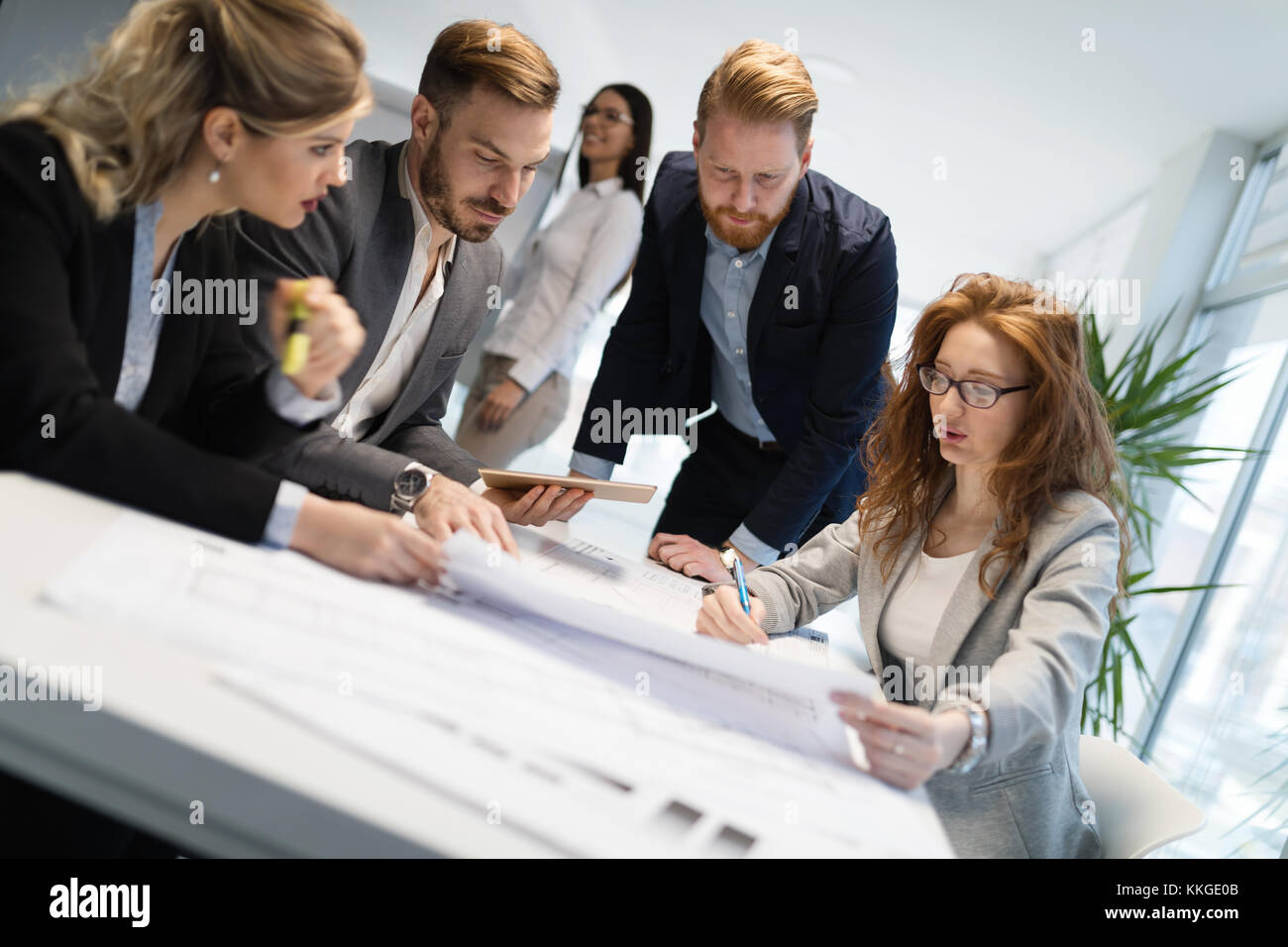 Team of architects working together on project Stock Photo