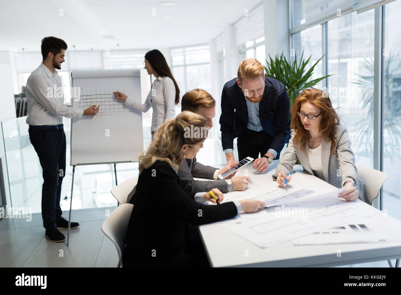 Team of architects working together on project Stock Photo