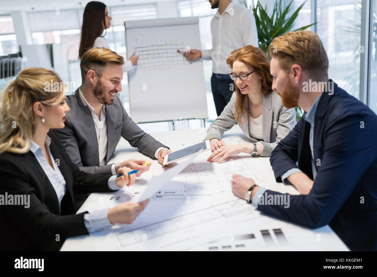 Team of architects working together on project Stock Photo