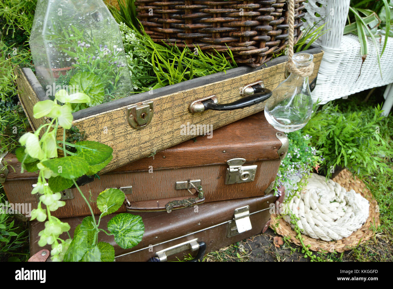 Beautiful Design In The Park Vintage Suitcases With Bottles