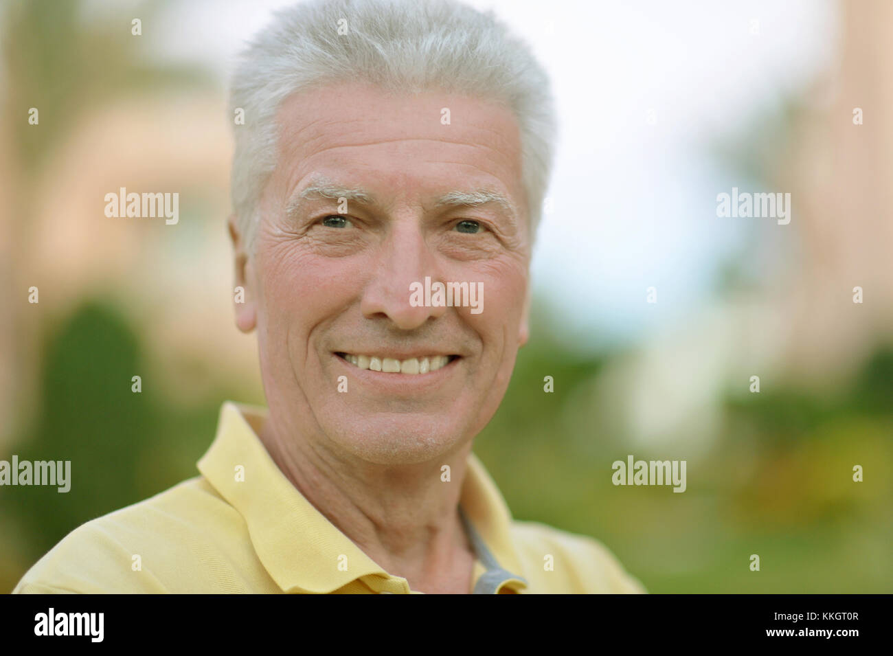 senior man  in summer park Stock Photo