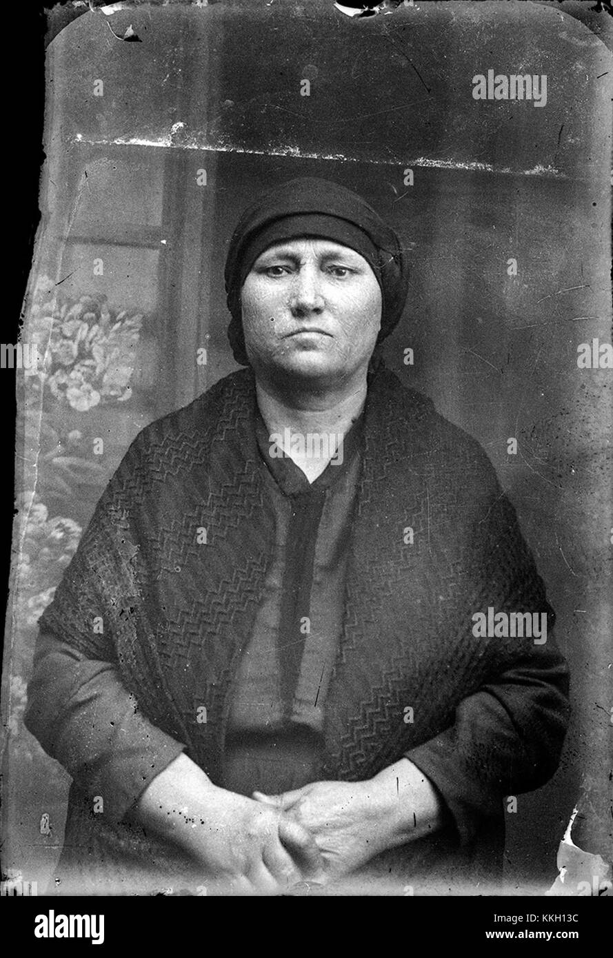 This portrait depicts a woman, captured in an image from December 4, 2013. The image portrays her facial features and expression, offering a glimpse into her identity and personal story at that moment. Stock Photo