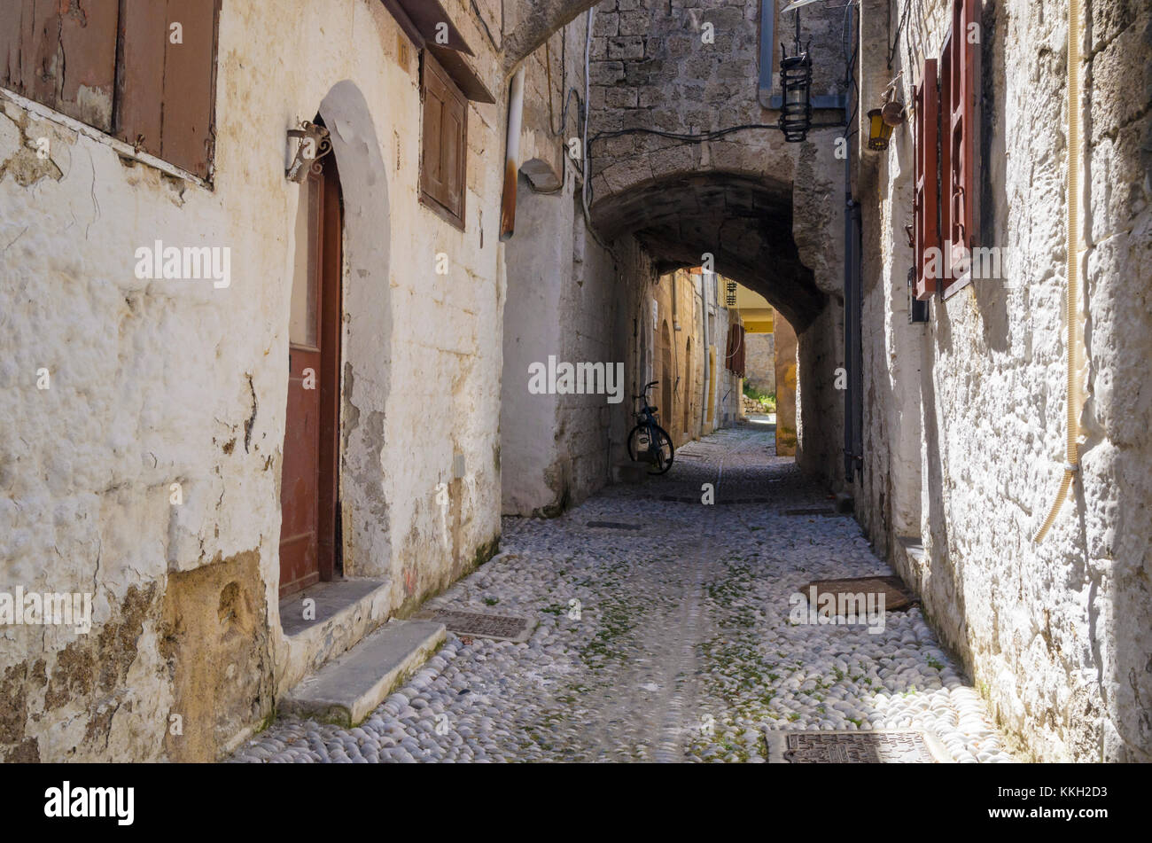 Narrow street in old Medieval Rhodes Town, Rhodes Island, Dodecanese, Greece Stock Photo