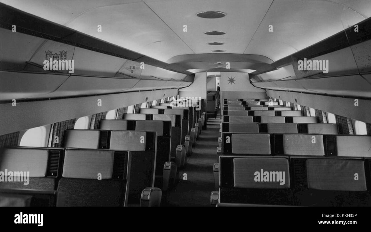 The Douglas DC-8 interior from 1957 showcases the design and features of this iconic jet airliner used for commercial flights. It highlights the mid-20th-century advancements in aviation interior design, offering comfort and functionality to passengers. Stock Photo