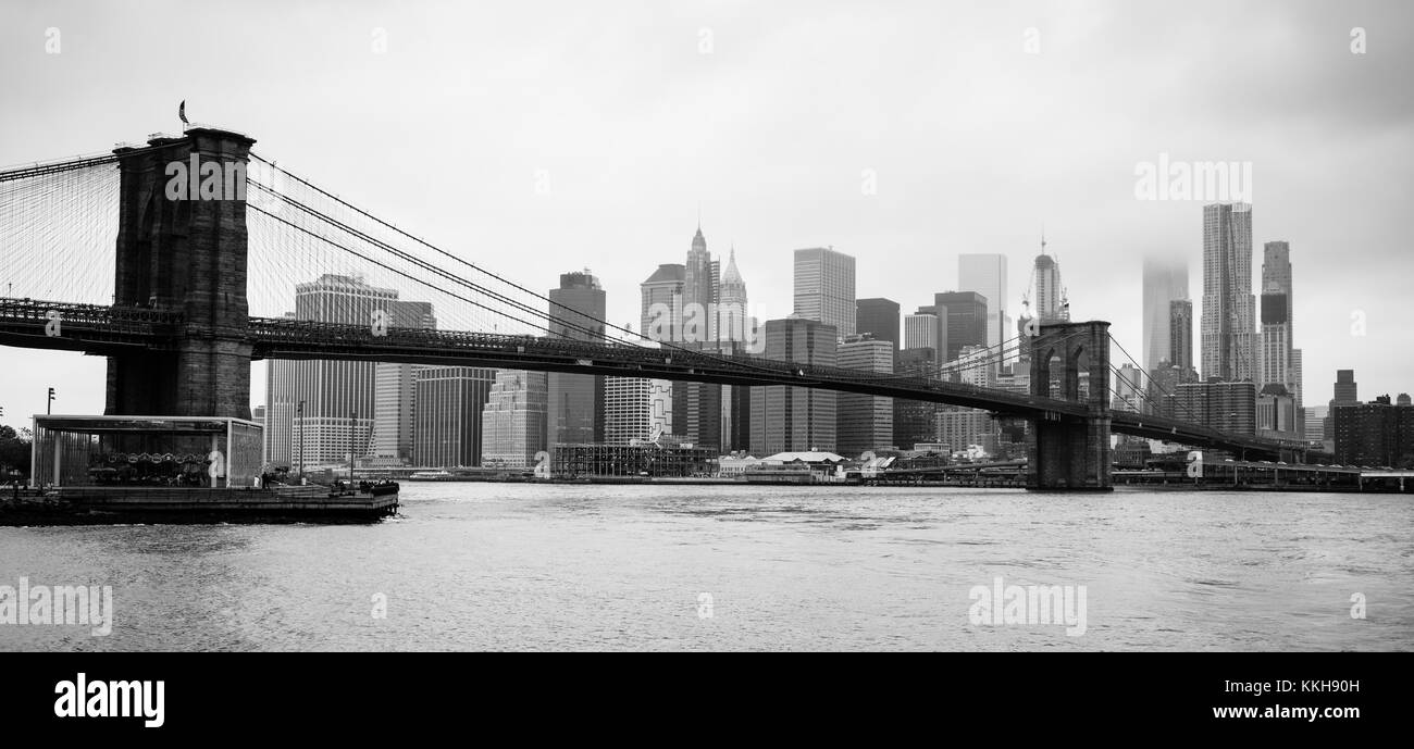 The Brooklyn Bridge spans the East River for travelers between Manhattan and Brooklyn Stock Photo