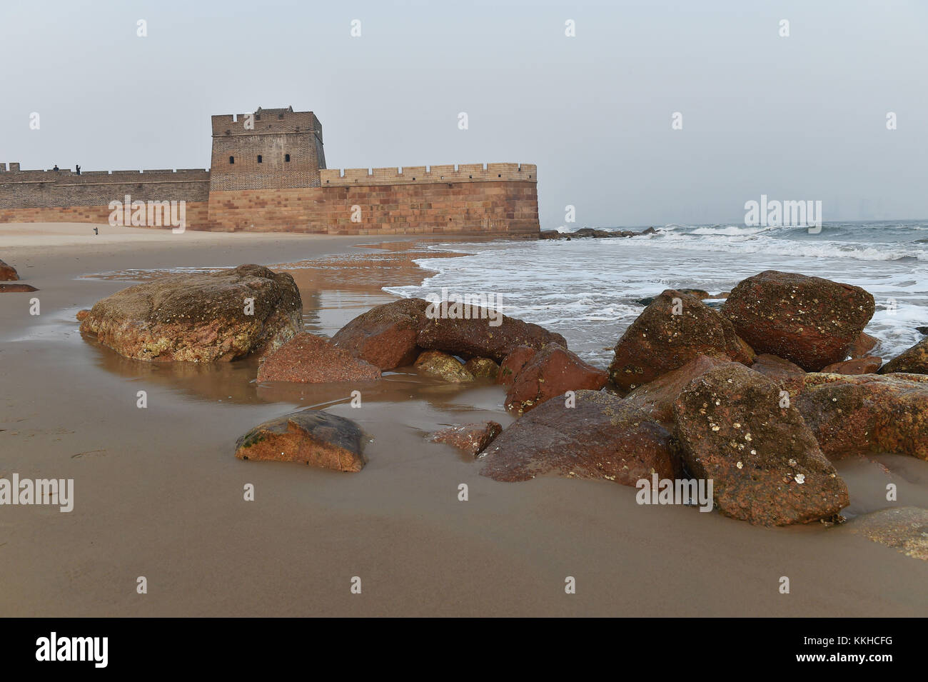 Qinhuangda, Qinhuangda, China. 30th Nov, 2017. Qinhuangdao, CHINA-November 2017:(EDITORIAL USE ONLY. CHINA OUT) .Laolongtou Great Wall, located at Shanhaiguan Scenic Area in Qinhuangdao, north China's Hebei Province, is also known as Old Dragon's Head Great Wall. Laolongtou is where the Great Wall of China meets the sea and was once considered as where the Great Wall of China starts. Laolongtou means Old Dragon'ss Head, so named because the Great Wall here resembles a dragon drinking water from the sea. Laolongtou is the only section of the great wall that extends into the sea. (Credit I Stock Photo