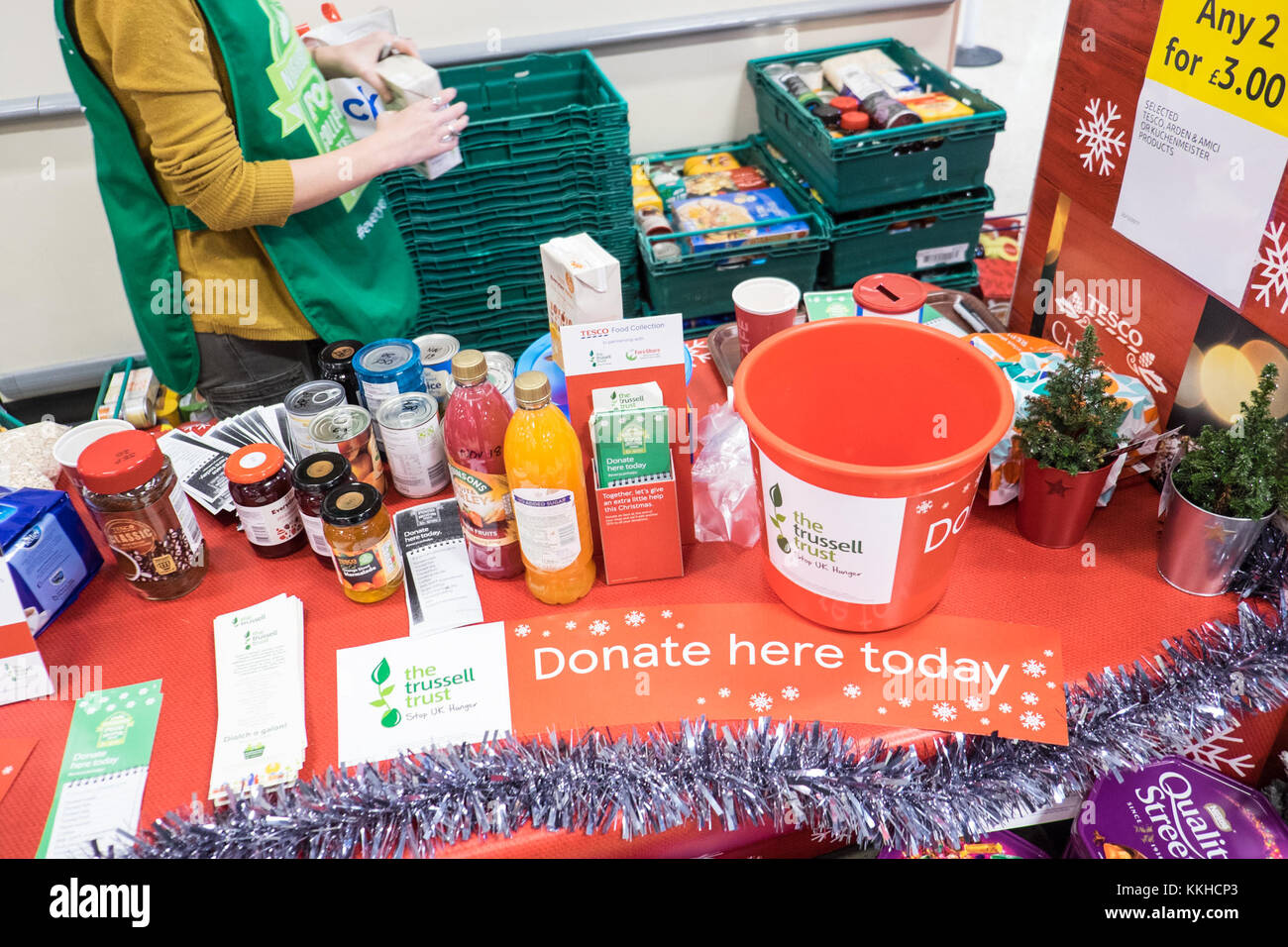 Neighbourhood Food Collection is held once a year in all Tesco stores in partnership with The Trussell Trust. Together,they collect food for people in need across the UK.The Trussell Trust runs a network of 400 foodbanks,giving emergency food and support to people experiencingcrisis in the UK. In the last year ,they have given over a million three-day emergency food supplies,with over 400,000 of those having gone to children. Stock Photo