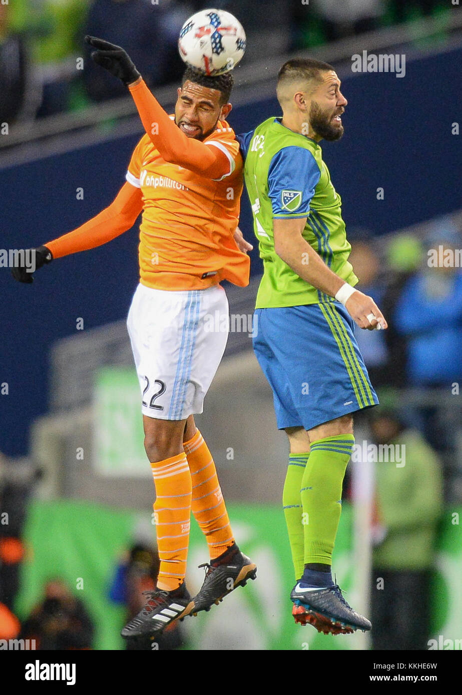 Seattle, Washington, USA. 30th Nov, 2017. Soccer 2017: CLINT DEMPSEY (2) and LEONARDO (22) battle for a header as the Houston Dynamo play the Seattle Sounders in the 2nd leg of the MLS Western Conference Finals match at Century Link Field in Seattle, WA. Credit: Jeff Halstead/ZUMA Wire/Alamy Live News Stock Photo