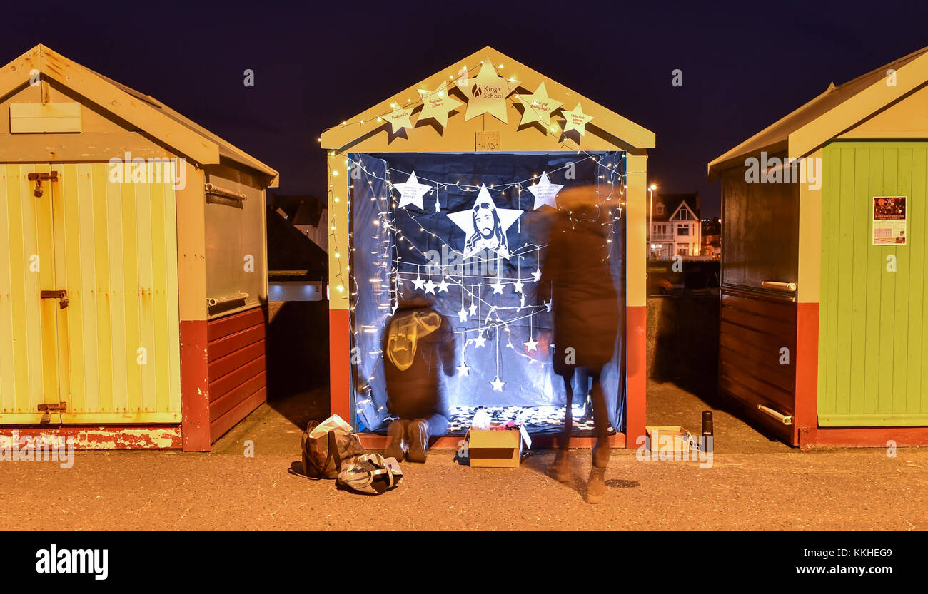 Hove Sussex, UK. 1st Dec, 2017. Linda Phelan and Charlotte Grosvenor put the final touches to the first beach hut involved in the 10th Annual Hove Beach Hut Advent Calendar which opened this evening and was designed by the local Kings School . The 10th Annual Beach Hut Advent Calendar will run from the 1st-24th December at various huts along Hove Seafront with one being opened each night up until Christmas Credit: Simon Dack/Alamy Live News Stock Photo