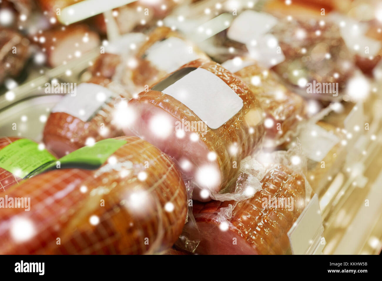 ham at grocery store stall Stock Photo Alamy