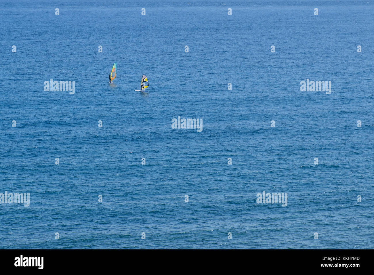 two windsurfer far away on ocean, aerial - Stock Photo