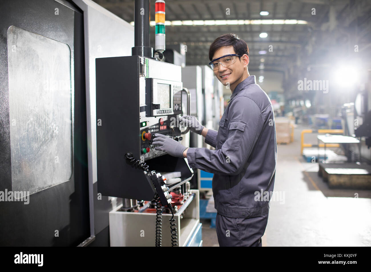 Place of work technology manual worker standing working operating ...