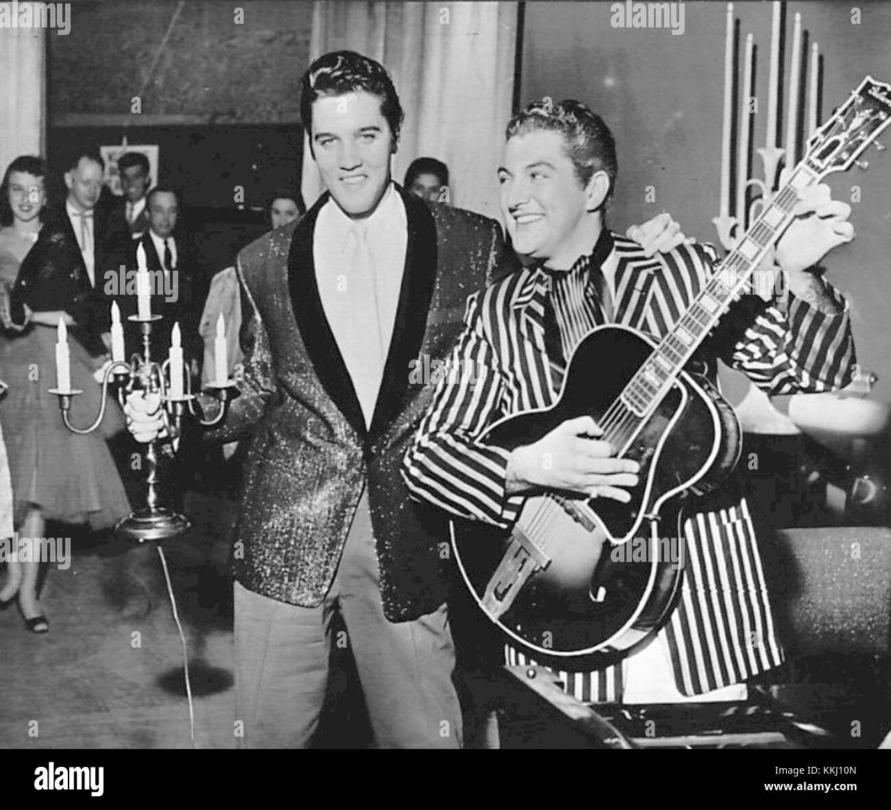 Elvis Presley, the 'King of Rock and Roll', and Liberace, a flamboyant pianist, both rose to fame in the 1950s. Their performances blended music and showmanship, captivating audiences worldwide. Stock Photo