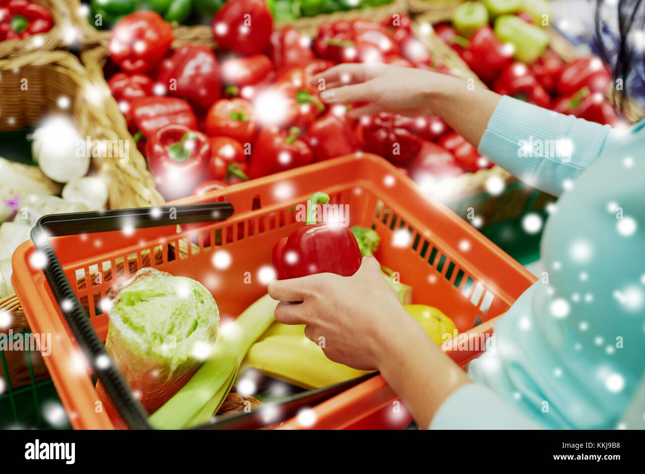 customer buying peppers at grocery store Stock Photo Alamy