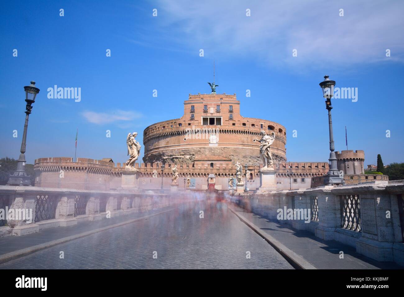 Bridge to the castle of San Angelo with many people in Rome. Stock Photo