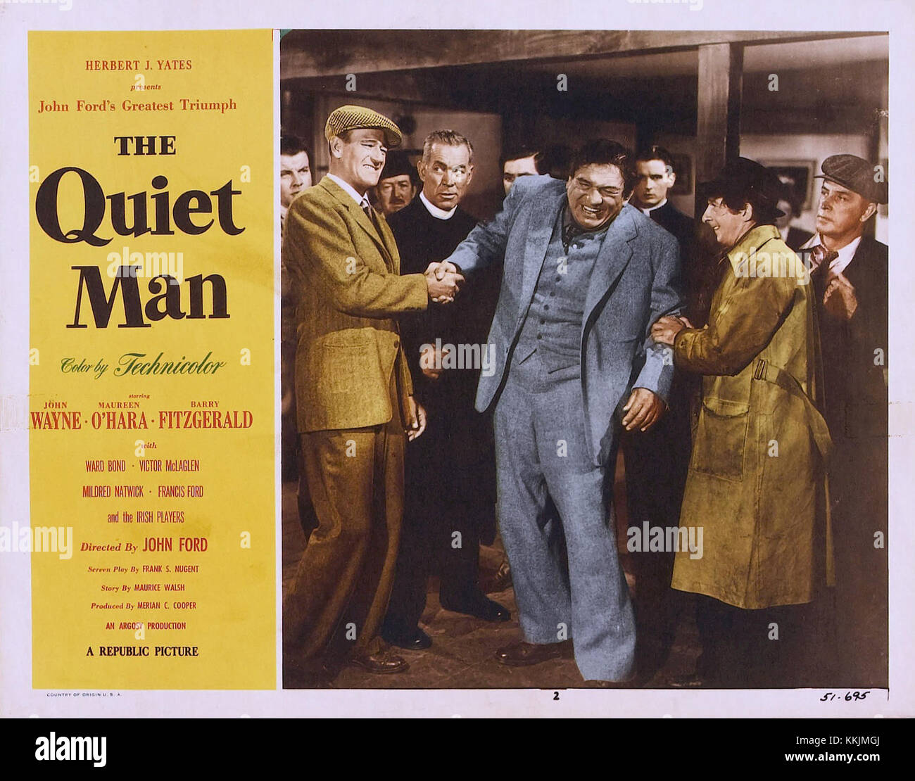 The lobby card for 'The Quiet Man' features an iconic scene from the film, portraying a key moment from this classic John Wayne film known for its depiction of Ireland and romance. Stock Photo