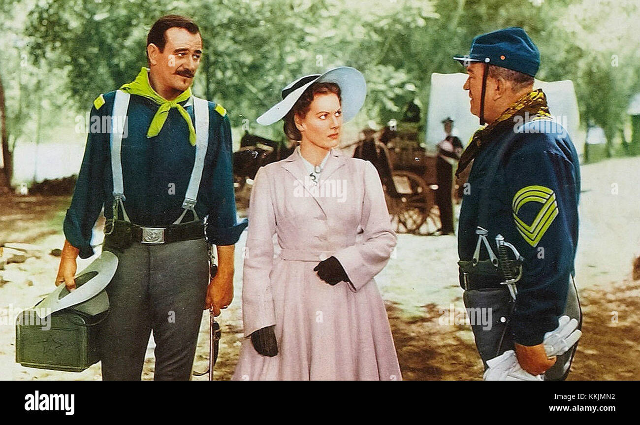 This lobby card from the film *The Quiet Man* features Maureen O'Hara and John Wayne. The card captures a classic moment from the 1952 film, known for its romance and Irish backdrop. Stock Photo