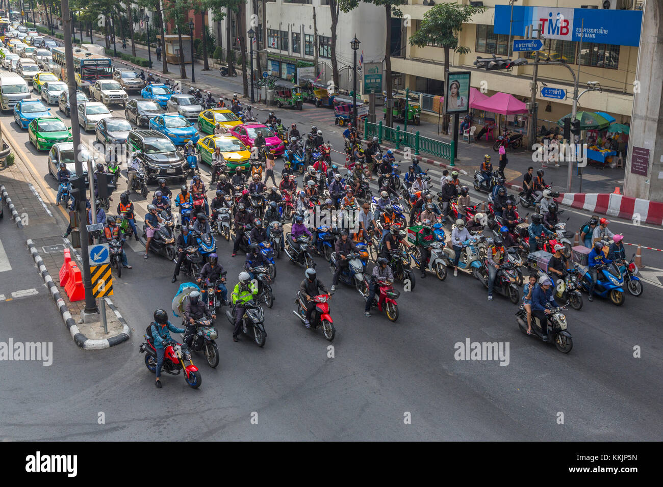 Bangkok, Thailand. Motorcycles at Intersection by the Erawan Shrine