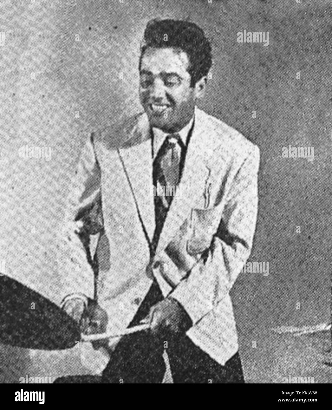 Gene Krupa was an iconic jazz drummer known for his energetic performances and contributions to the jazz music scene. This billboard likely promotes his image and music. Stock Photo