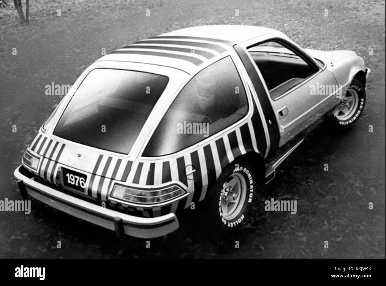 The 1976 AMC Pacer Stinger was a unique American compact car known for its distinctive design. The Pacer was showcased at various auto shows, becoming a symbol of the 1970s automotive culture. Stock Photo