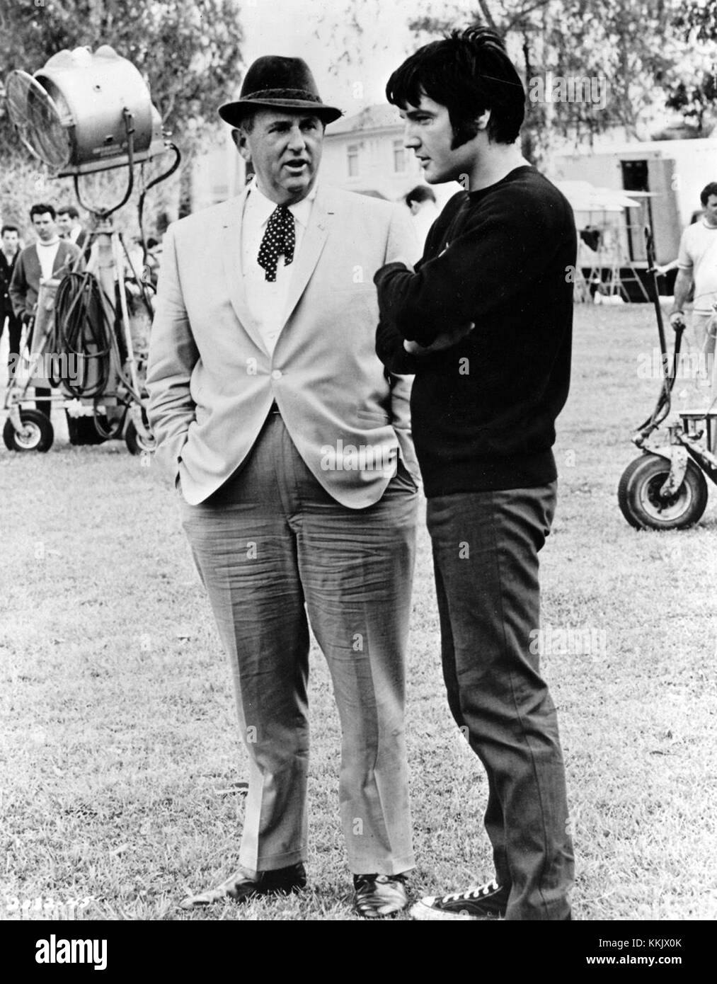 Elvis Presley and his manager, Colonel Tom Parker, were integral to the success of Presley's career in the late 1960s. This period marked a resurgence in Elvis's music and popularity, with notable performances and recordings defining his legacy in the music industry. Stock Photo