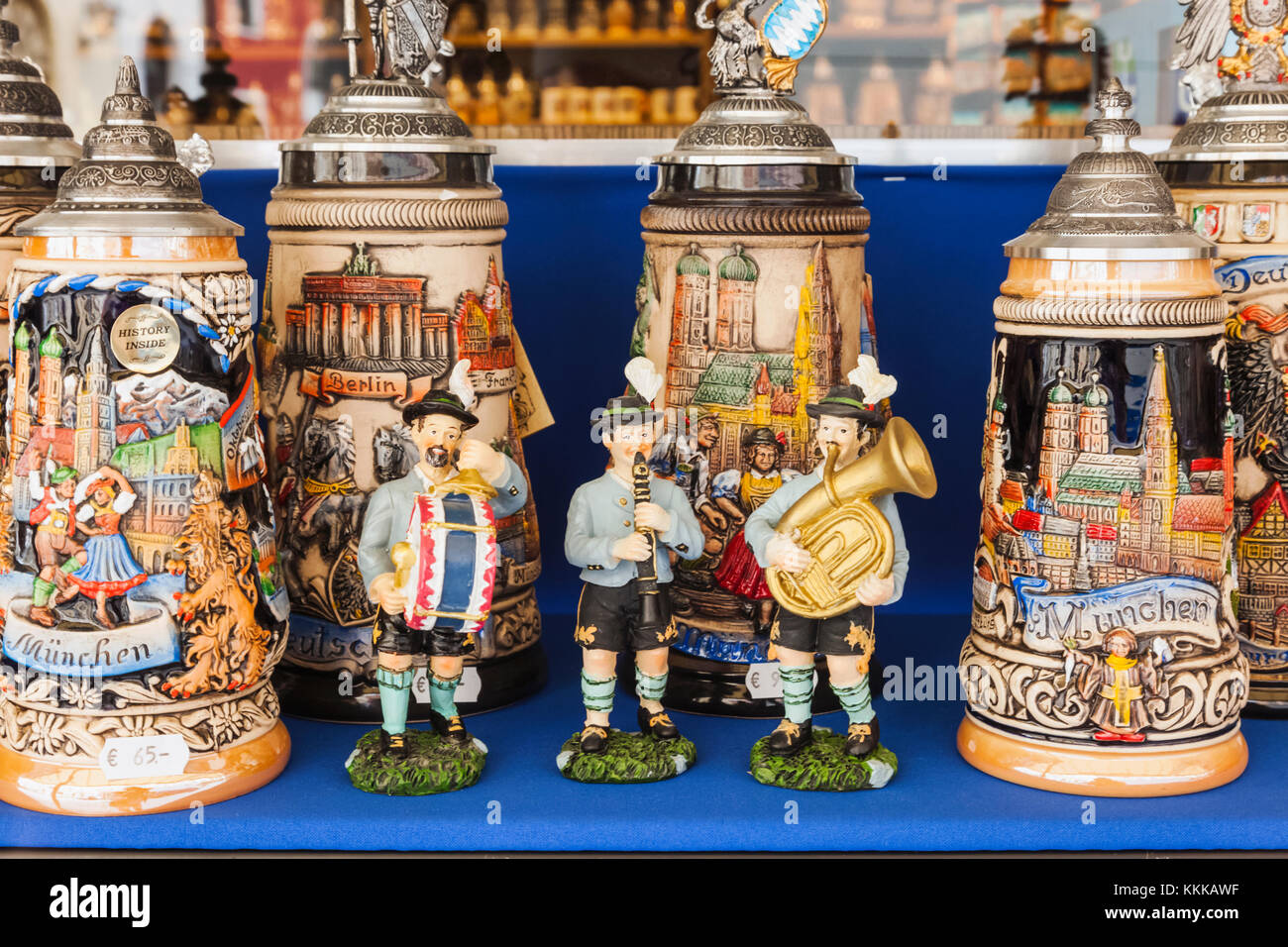 Germany, Bavaria, Munich, Marienplatz, Souvenir Shop Display of Beersteins  and Figures Dressed as Bavarian Musicians Stock Photo - Alamy