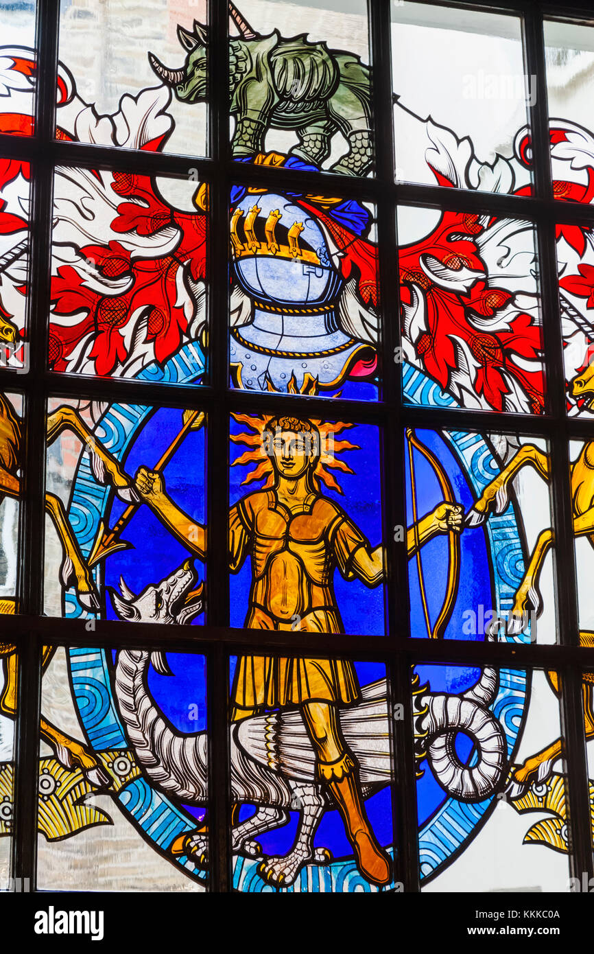 Stained glass window depicting the societies coats of arms hires stock