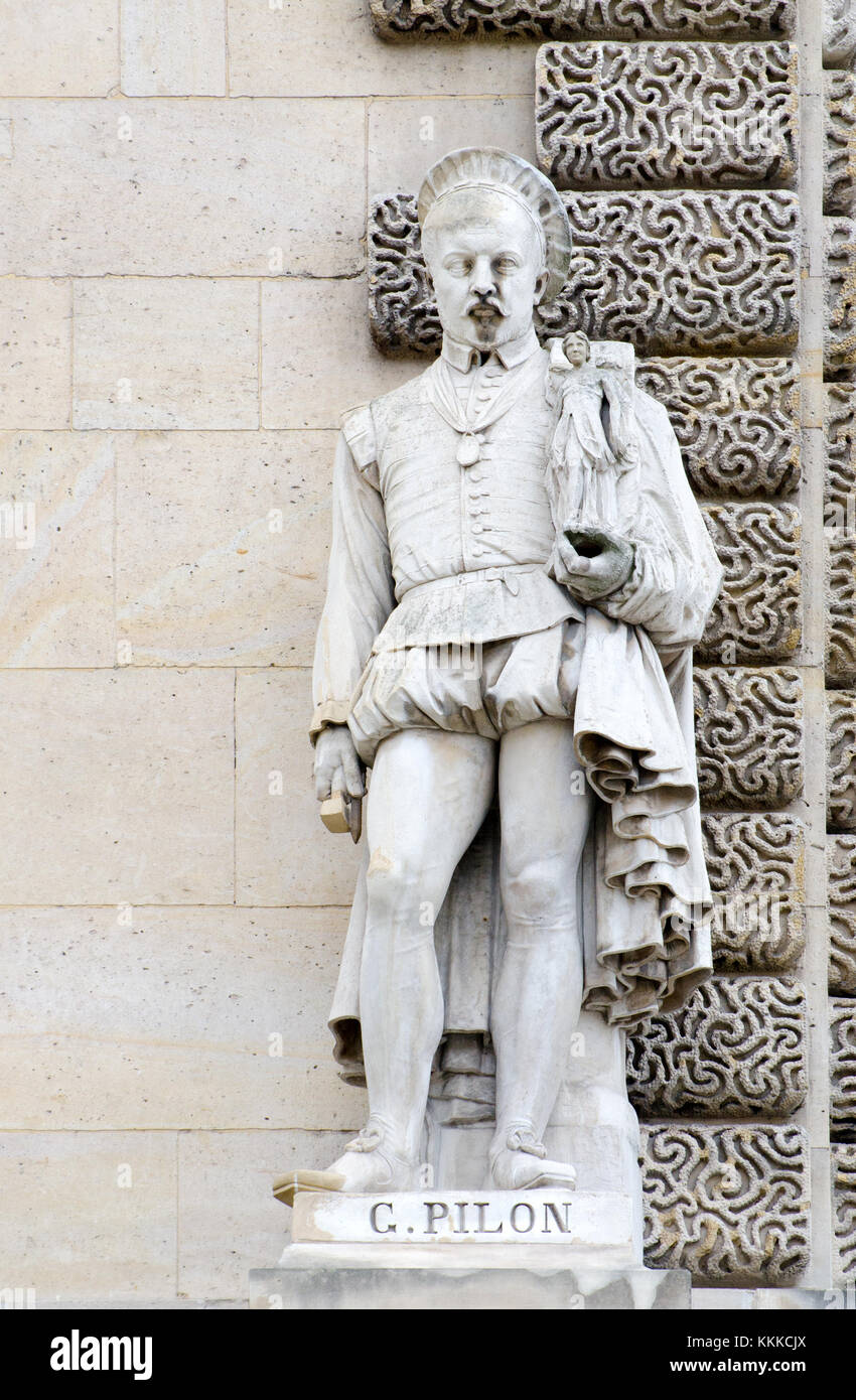 Paris, France. Palais du Louvre. Statue in the Cour Napoleon: Germain Pilon (c 1525 – 1590) French Renaissance sculptor. Stock Photo