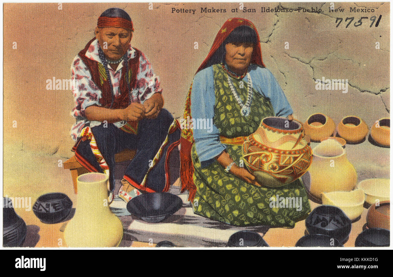 Pottery makers at San Ildefonso Pueblo in New Mexico are known for their skillful craftsmanship and cultural heritage. The image captures artisans at work, creating traditional pottery that has been passed down through generations, reflecting the rich Native American traditions of the region. Stock Photo