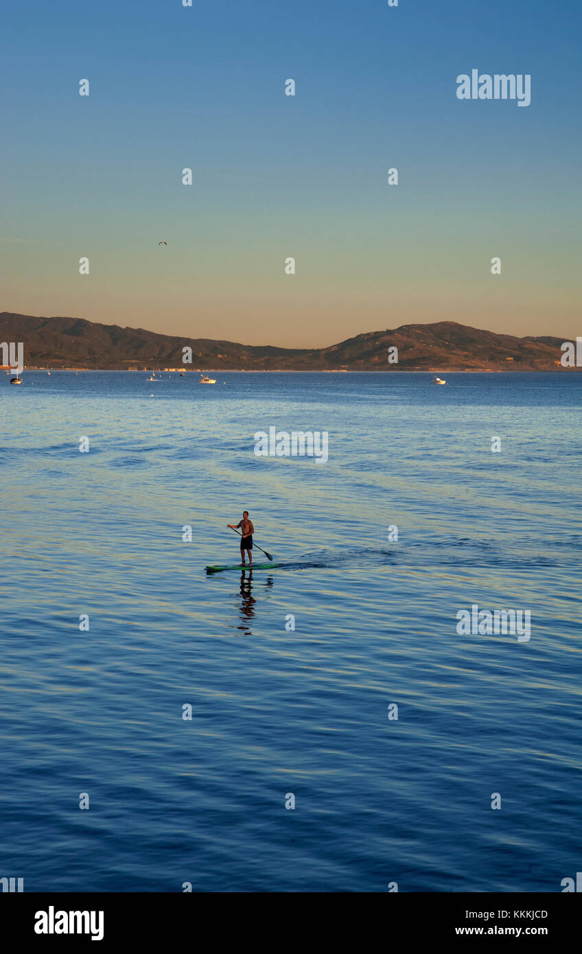 Paddle surfer off California coast at Santa Barbara Stock Photo