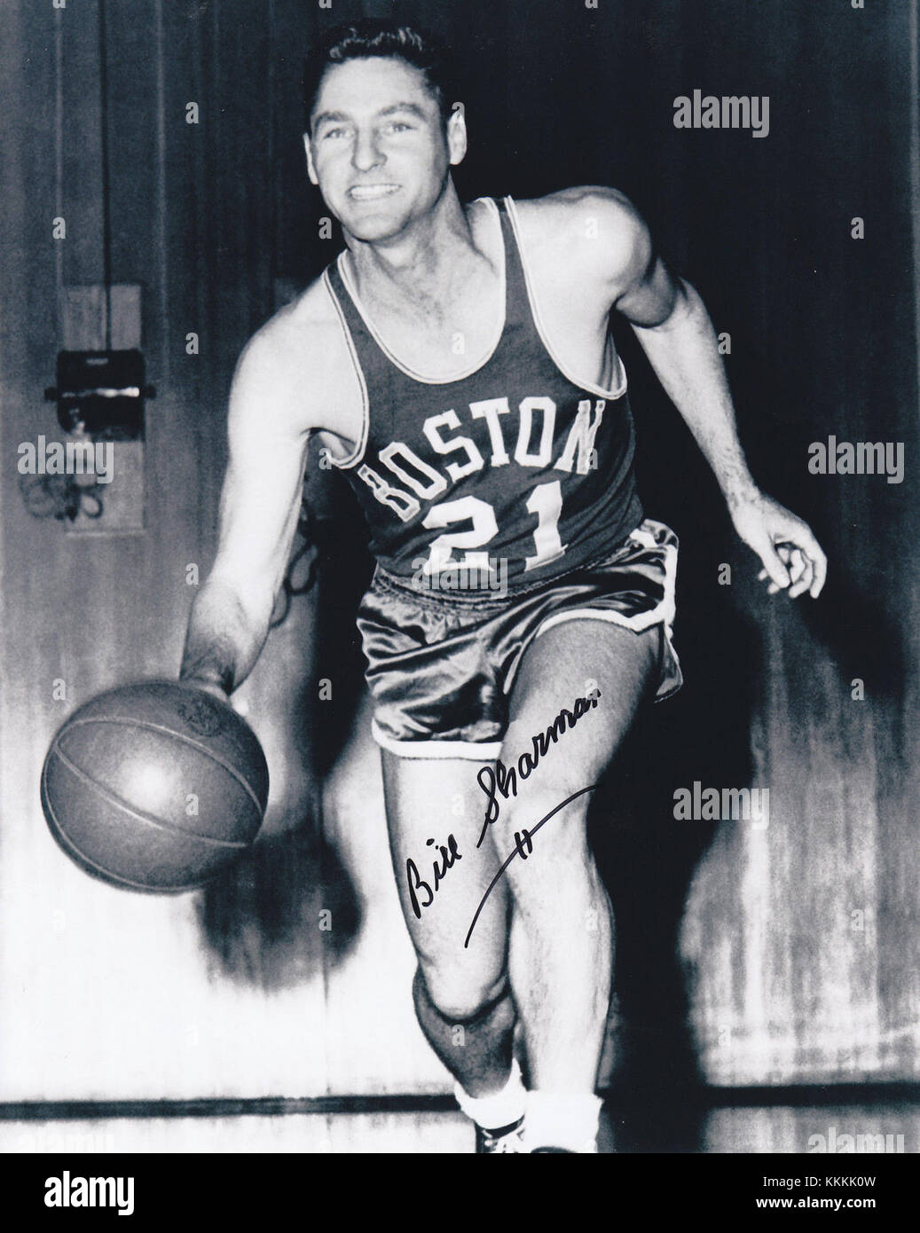 A signed photograph of Bill Sharman, a former player for the Boston Celtics. Sharman is recognized for his contributions to the team's success during the 1950s and 1960s. Stock Photo